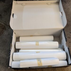 Box of automotive vinyl wrap scrap rolls