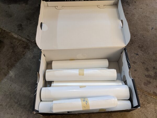 Box of automotive vinyl wrap scrap rolls